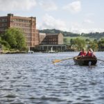 Rowing boat on river at Belper